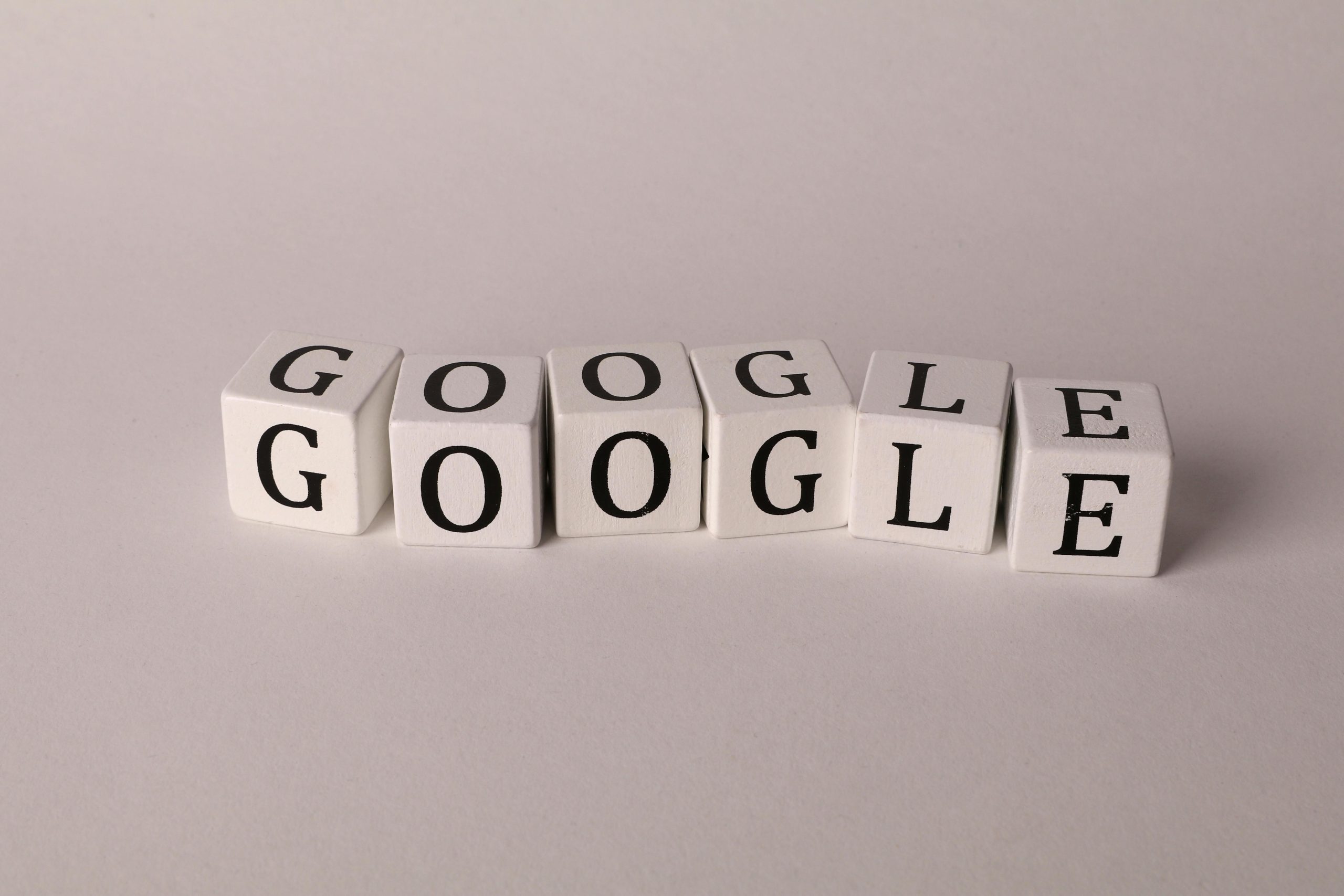 White blocks with letters spelling Google, symbolizing search and SEO concepts.